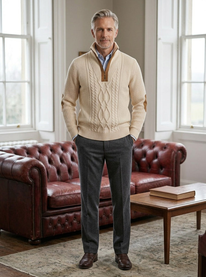 Pritchard cable knit quarter zip sweater in Cream, lifestyle in a club reading room, Gentlemens Manor