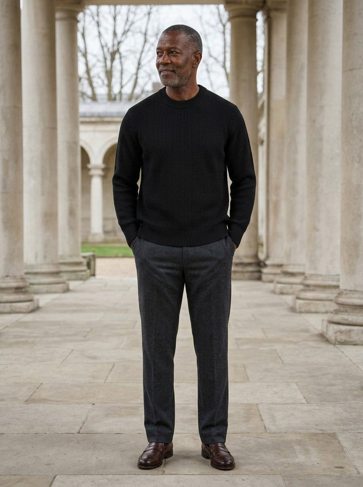Pryor sweater in Black, lifestyle in a stone colonnade, Gentlemens Manor