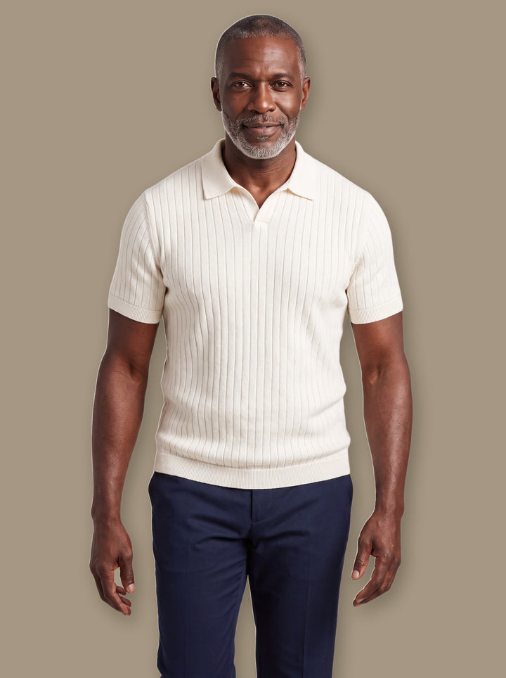 Quentin polo shirt in White, worn by a model on a warm taupe studio background - Gentlemens Manor