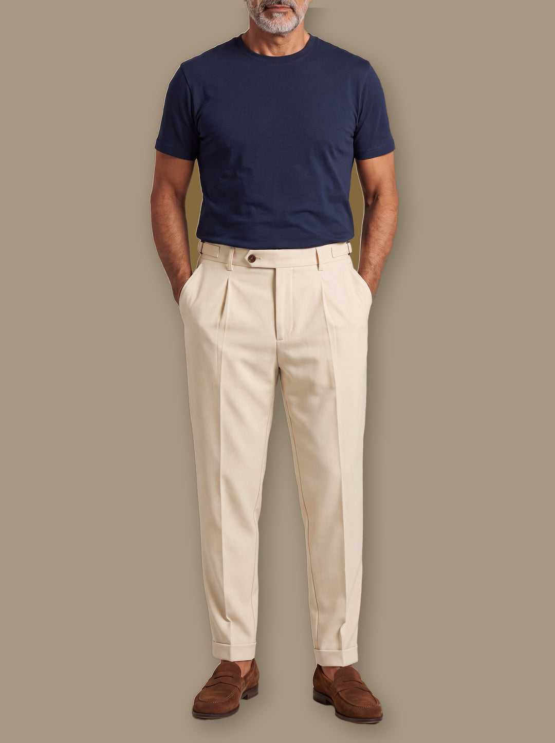 Ralph trousers in Cream, worn by a model on a warm taupe studio background - Gentlemens Manor