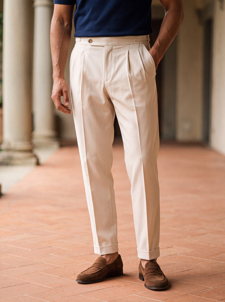 Ralph trousers in Cream, worn by a model in a Mediterranean setting - Gentlemens Manor lifestyle