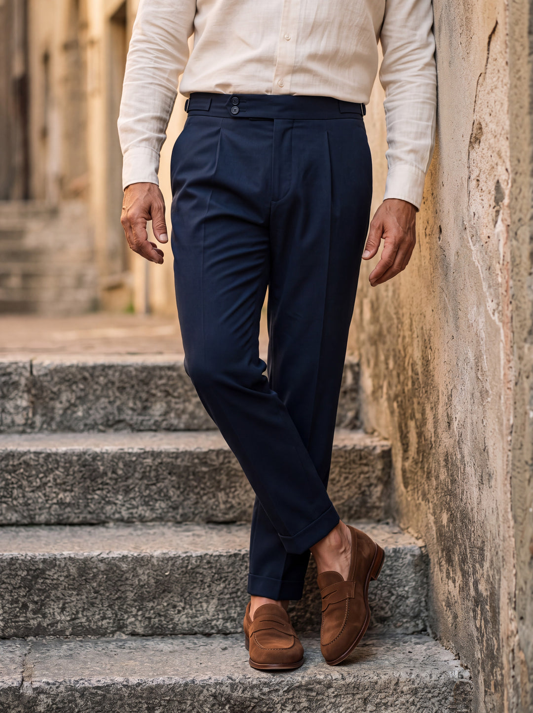 Ralph trousers in Navy, worn by a model in a Mediterranean setting - Gentlemens Manor lifestyle