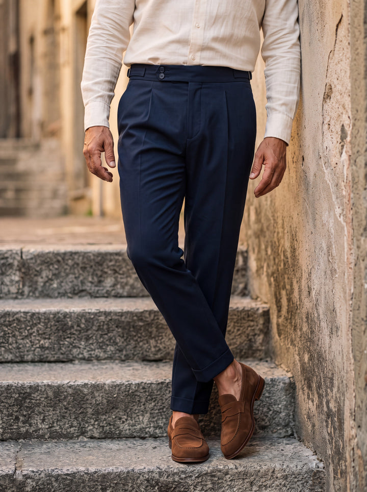 Ralph trousers in Navy, worn by a model in a Mediterranean setting - Gentlemens Manor lifestyle
