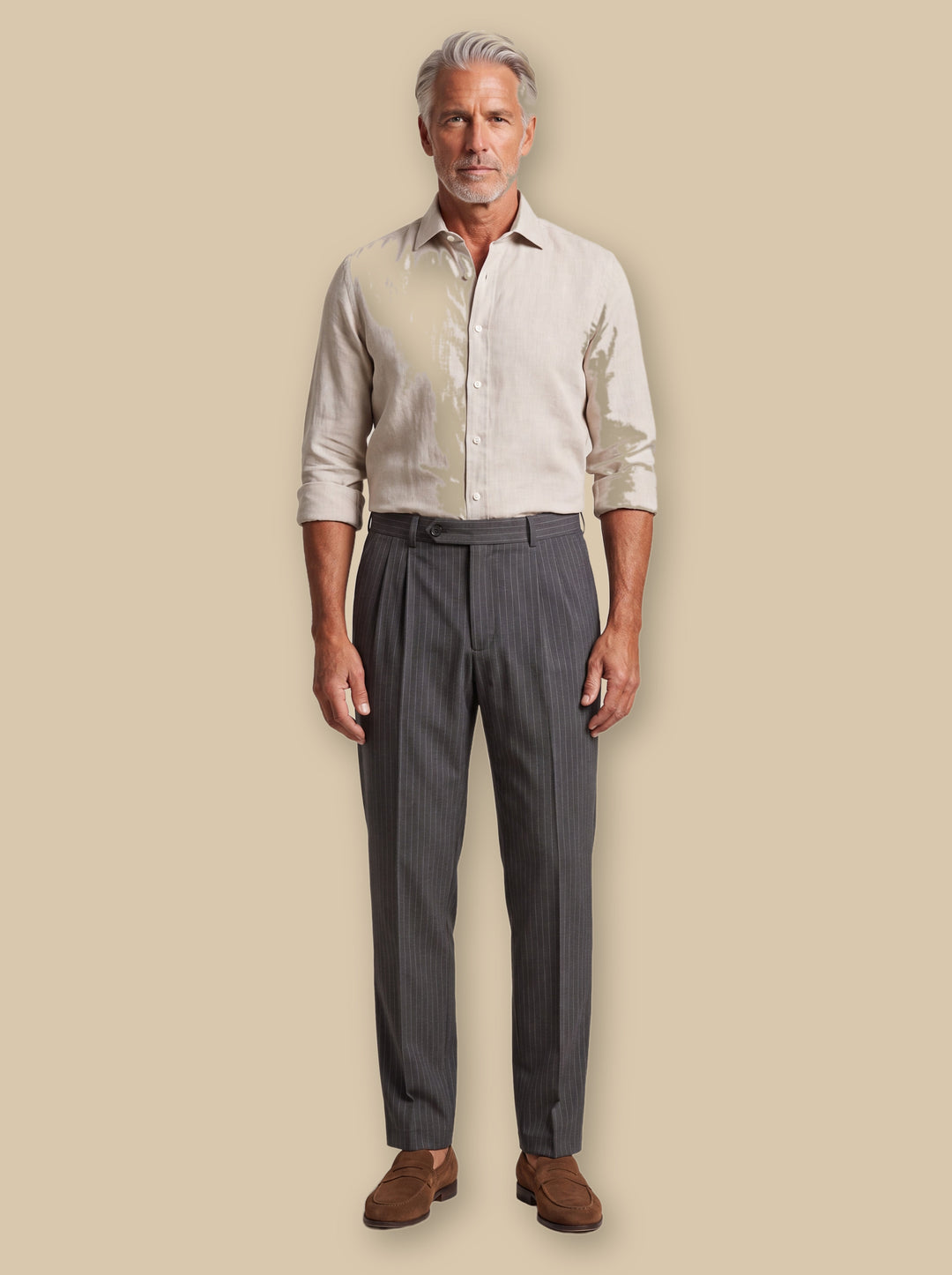 Randall trousers in Black, worn by a model on a warm sand studio background - Gentlemens Manor