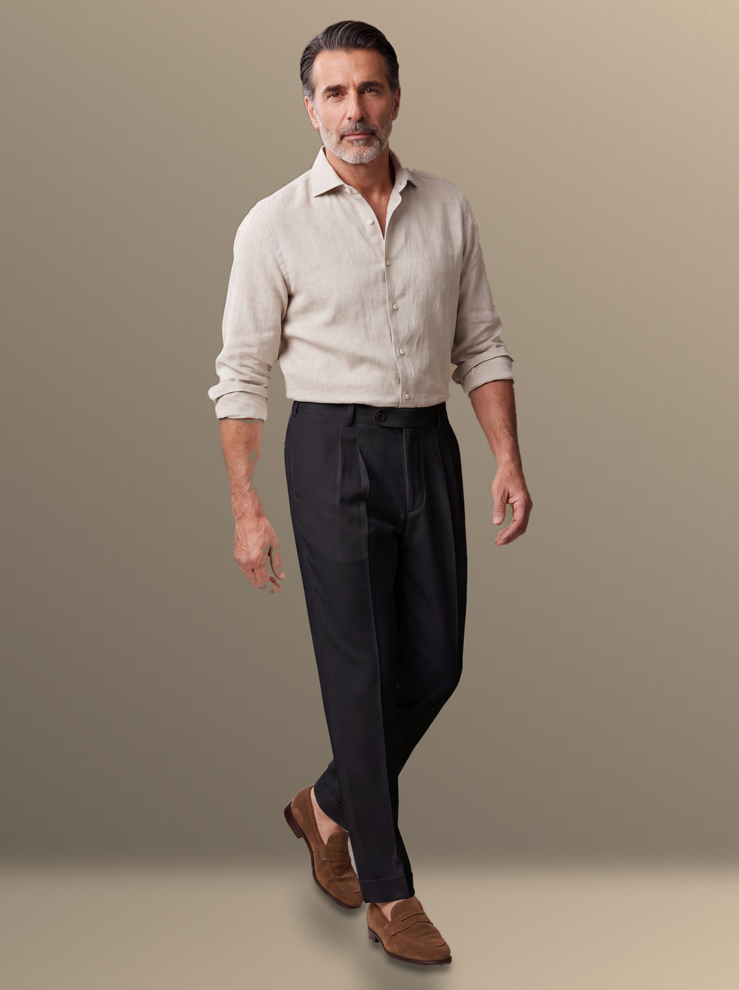 Ransom trousers in Black, worn by a model on a soft blue studio background - Gentlemens Manor