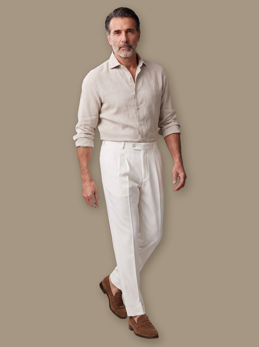 Ransom trousers in White, worn by a model on a warm taupe studio background - Gentlemens Manor