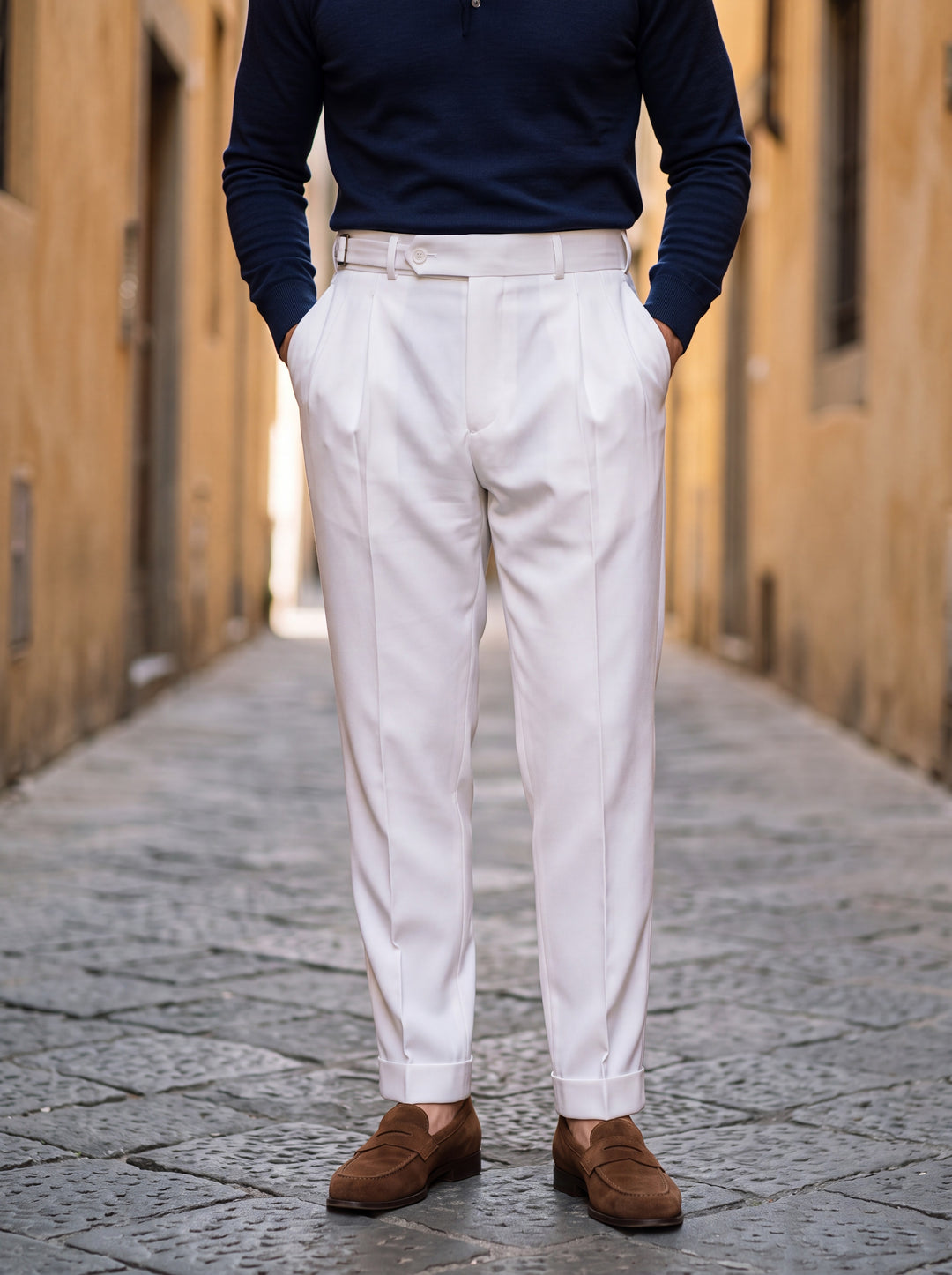 Ransom trousers in White, worn by a model in a Mediterranean setting - Gentlemens Manor lifestyle