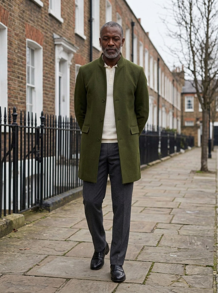 Rawlins stand collar tailored jacket in Olive, lifestyle on a street of brick row houses, Gentlemens Manor