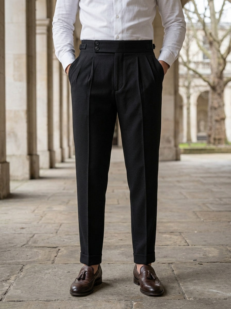 Redfield dress pants in Black, lifestyle in a stone colonnade, Gentlemens Manor