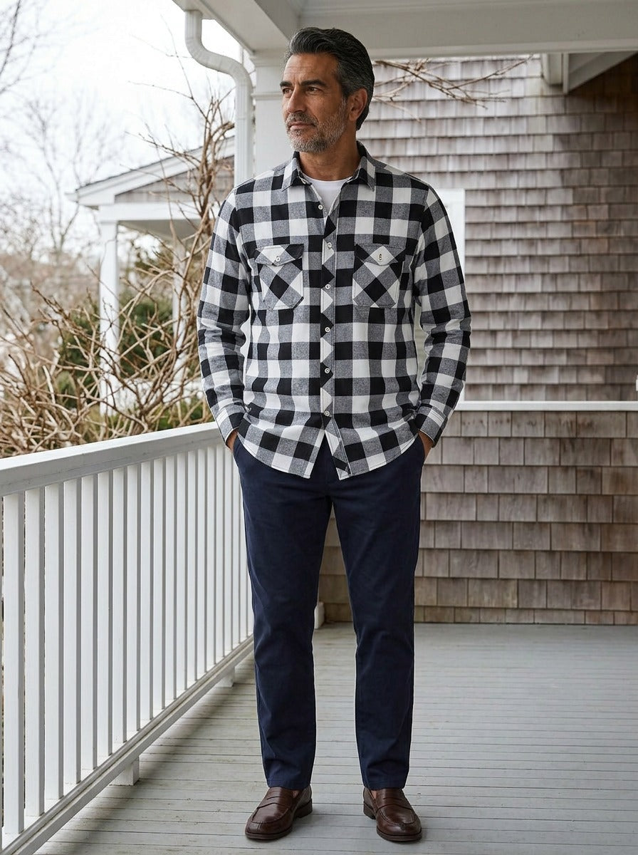 Reeves buffalo plaid flannel shirt in Black, lifestyle on a covered porch, Gentlemens Manor