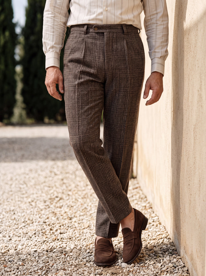 Reid trousers in Brown, worn by a model in a Mediterranean setting - Gentlemens Manor lifestyle