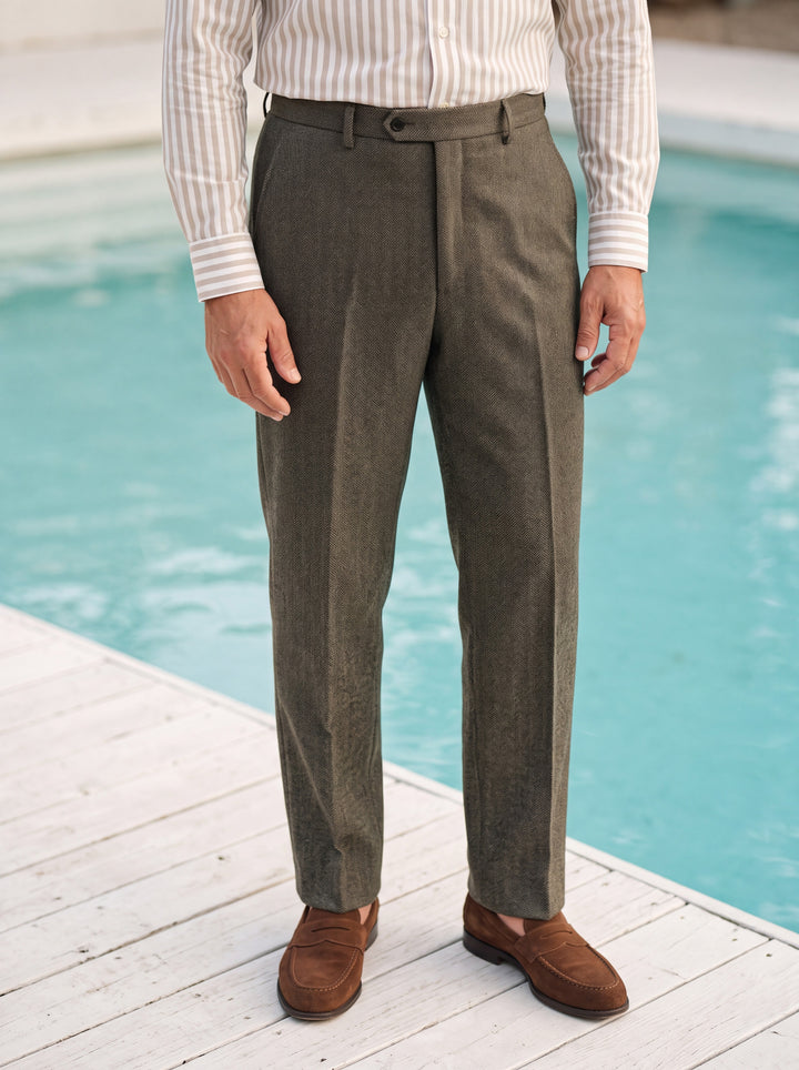 Rex trousers in Brown, worn by a model in a Mediterranean setting - Gentlemens Manor lifestyle