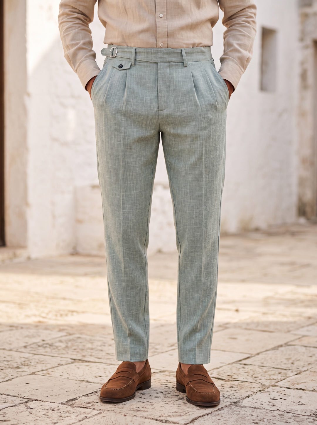 Richmond trousers in Green, worn by a model in a Mediterranean setting - Gentlemens Manor lifestyle