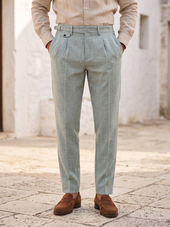 Richmond trousers in Green, worn by a model in a Mediterranean setting - Gentlemens Manor lifestyle