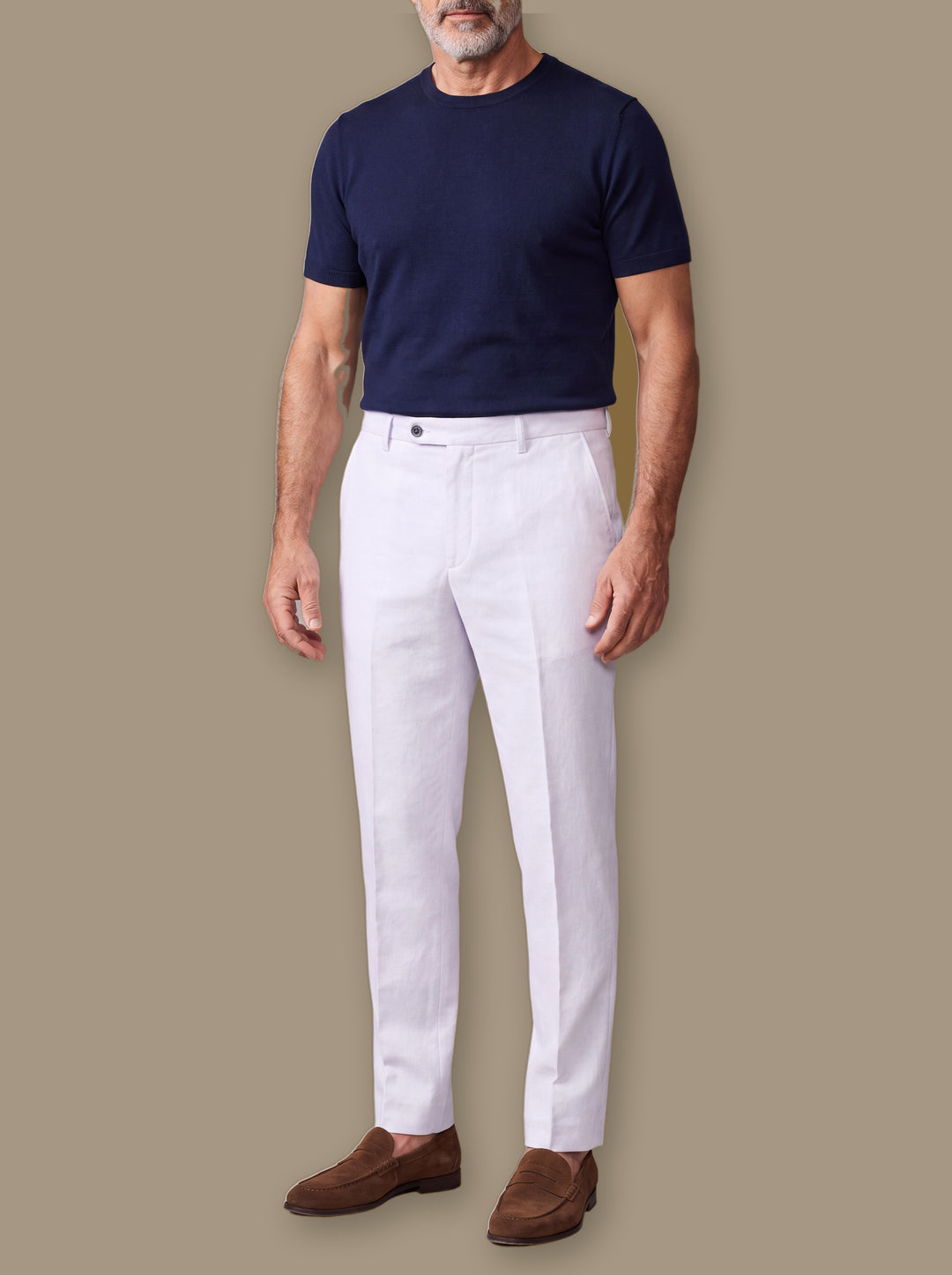 Robert trousers in White, worn by a model on a warm taupe studio background - Gentlemens Manor