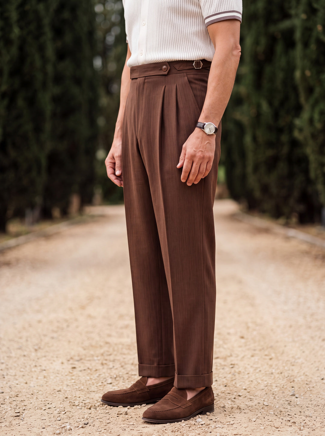 Roderick trousers in Brown, worn by a model in a Mediterranean setting - Gentlemens Manor lifestyle