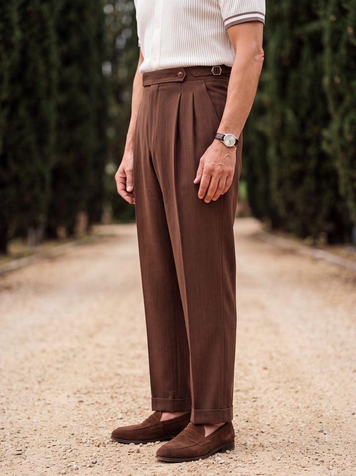 Roderick trousers in Brown, worn by a model in a Mediterranean setting - Gentlemens Manor lifestyle
