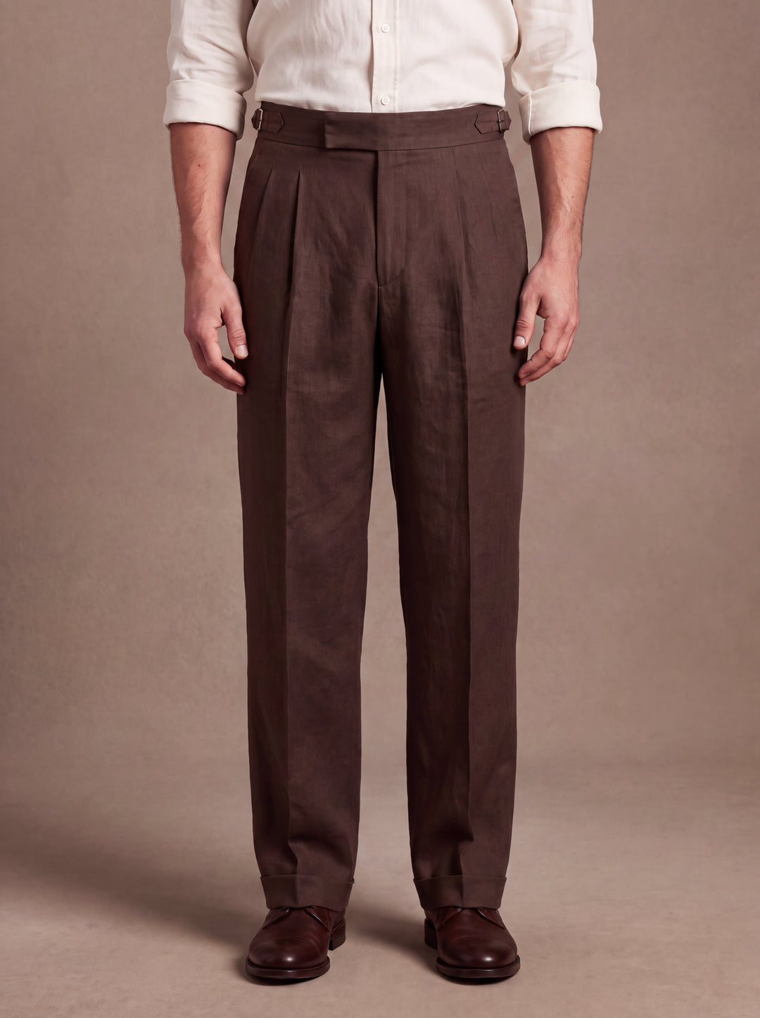 Roman trousers in Brown, loose straight leg with flat waistband and side adjusters, studio, Gentlemens Manor