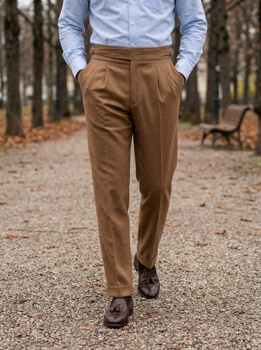 Rupert turn up cuff pleated trousers in Camel, lifestyle on a park path, Gentlemens Manor
