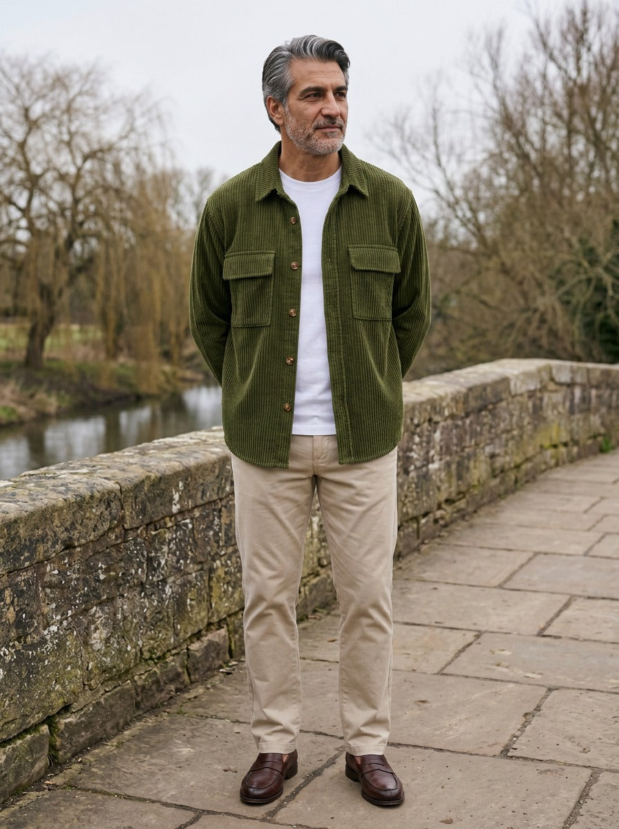 Rutland overshirt in Olive, lifestyle on a stone footbridge, Gentlemens Manor