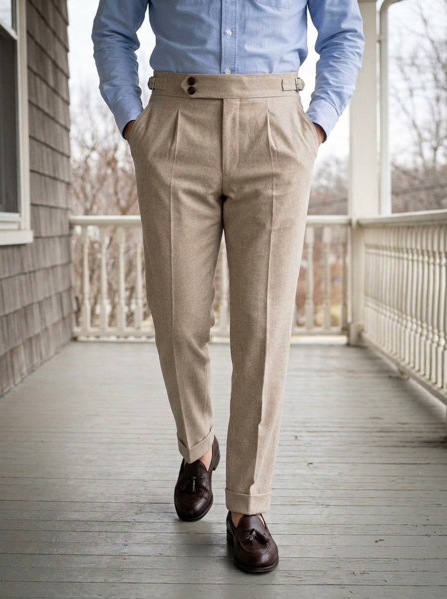 Somerset side buckle pleated trousers in Beige, lifestyle on a covered porch, Gentlemens Manor