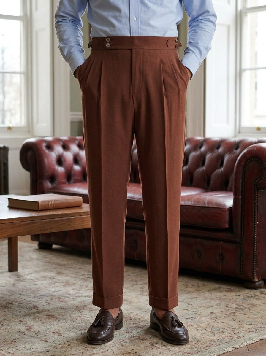 Somerset side buckle pleated trousers in Brown, lifestyle in a club reading room, Gentlemens Manor