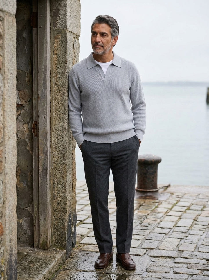 Stafford sweater in Light Grey, lifestyle on a stone harbor quay, Gentlemens Manor