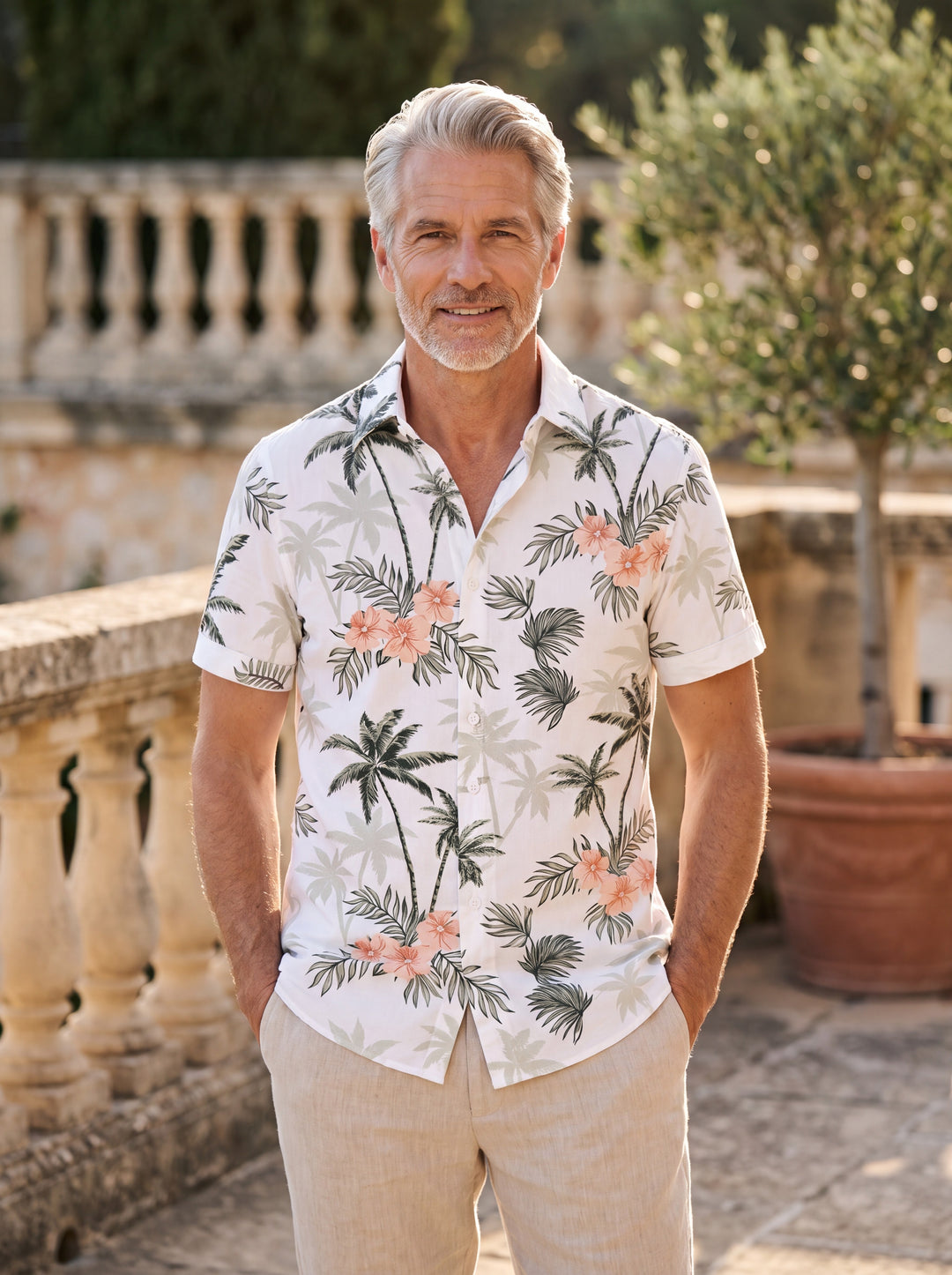 Sterling Men short sleeve shirt in white, worn by a model on a Mediterranean terrace - Gentlemens Manor lifestyle