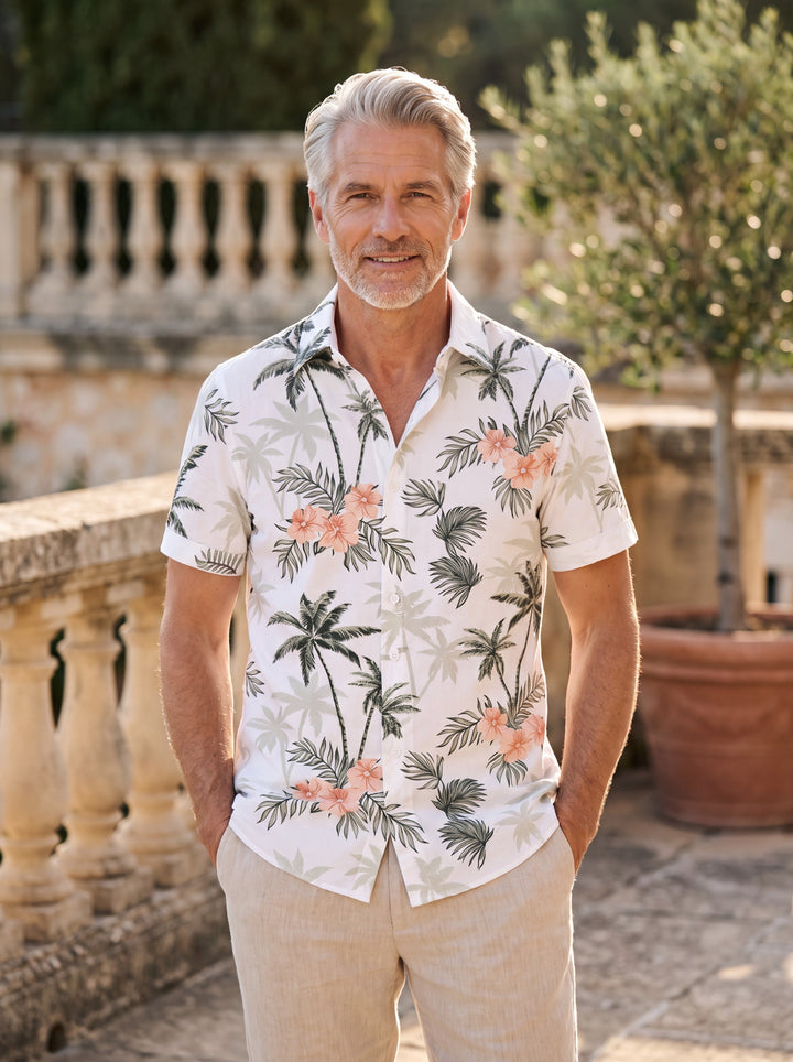 Sterling Men short sleeve shirt in white, worn by a model on a Mediterranean terrace - Gentlemens Manor lifestyle