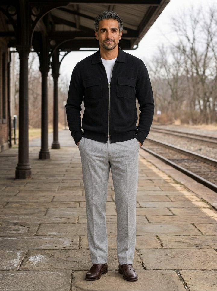 Stockton zip knit jacket chest pockets in Black, lifestyle on a railway platform, Gentlemens Manor
