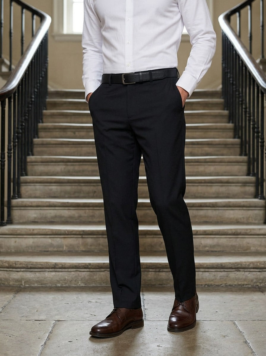 Sullivan flat front stretch dress pants in Black, lifestyle on a civic stone staircase, Gentlemens Manor