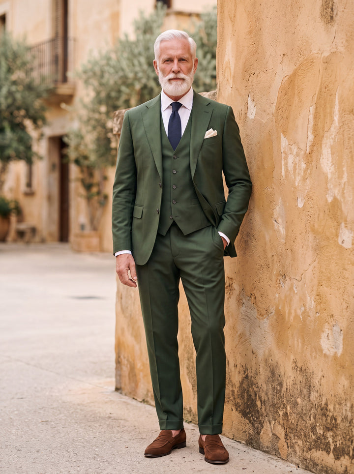 Thayer Men three-piece suit in olive, worn by a model in a Mediterranean setting - Gentlemens Manor lifestyle
