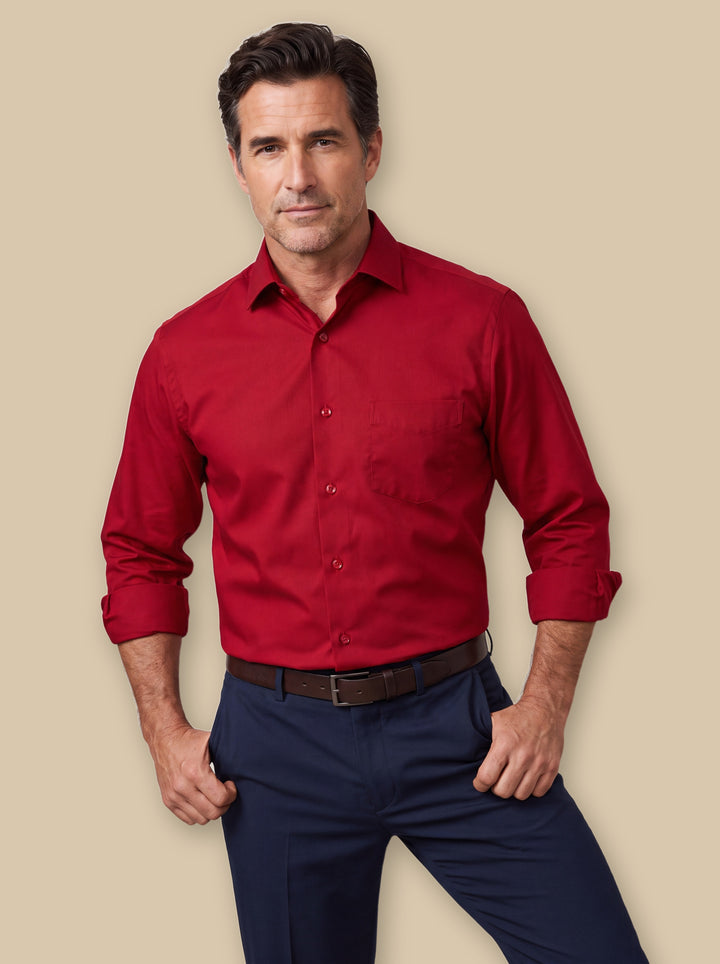 Theodore dress shirt in Red, worn by a model on a warm sand studio background - Gentlemens Manor
