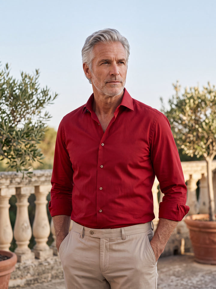 Theodore shirt in Red, worn by a model in a Mediterranean setting - Gentlemens Manor lifestyle