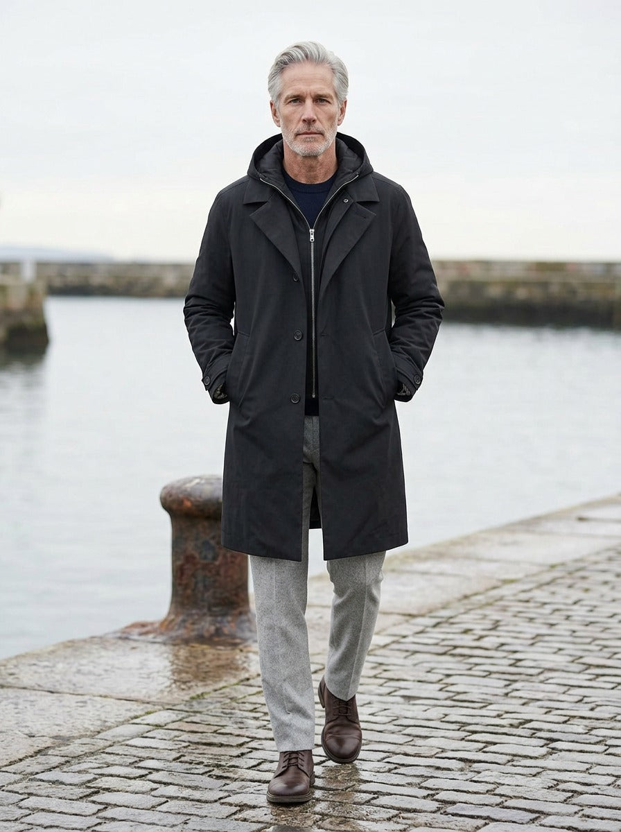 Underwood parka in Black, lifestyle on a stone harbor quay, Gentlemens Manor