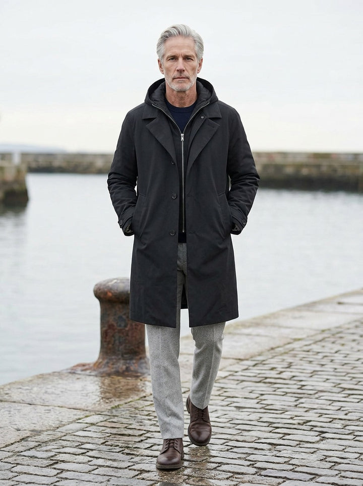 Underwood parka in Black, lifestyle on a stone harbor quay, Gentlemens Manor