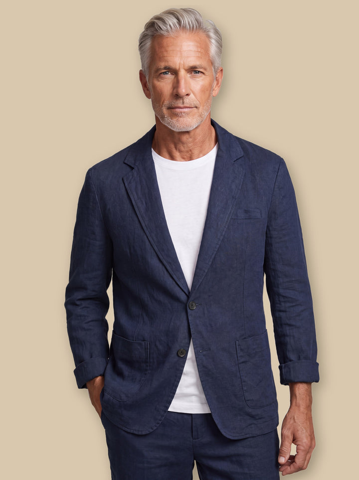 Upton blazer suit in Blue, worn by a model on a warm sand studio background - Gentlemens Manor