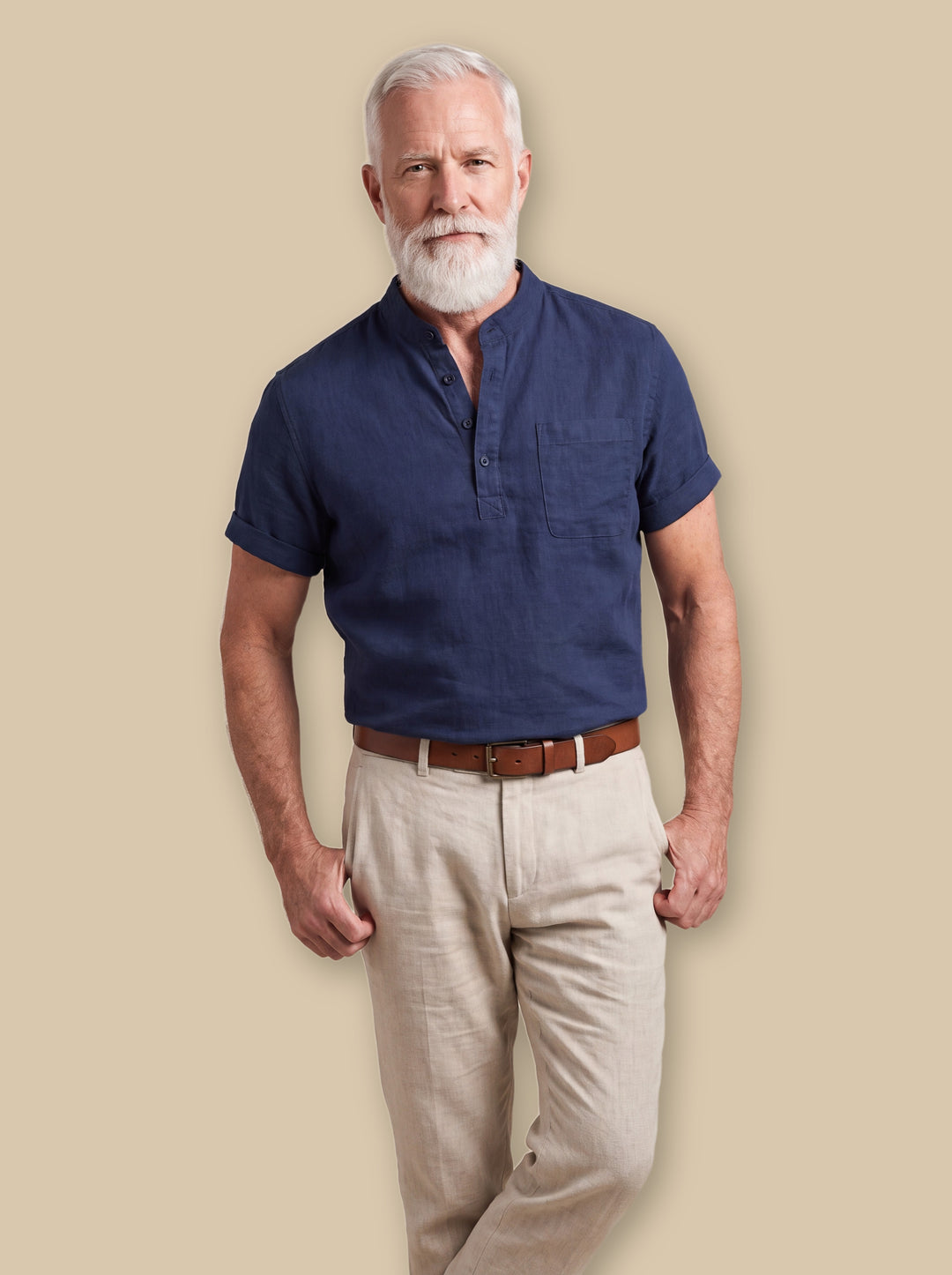 Vincent linen shirt in Navy, worn by a model on a warm sand studio background - Gentlemens Manor