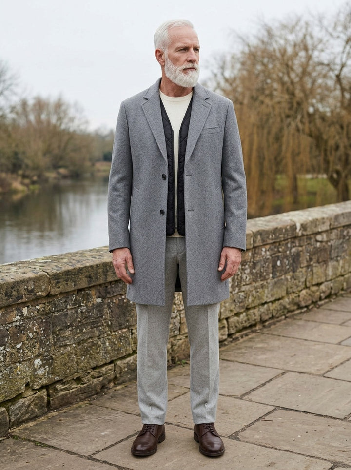 Wadsworth topcoat in Grey, lifestyle on a stone footbridge, Gentlemens Manor