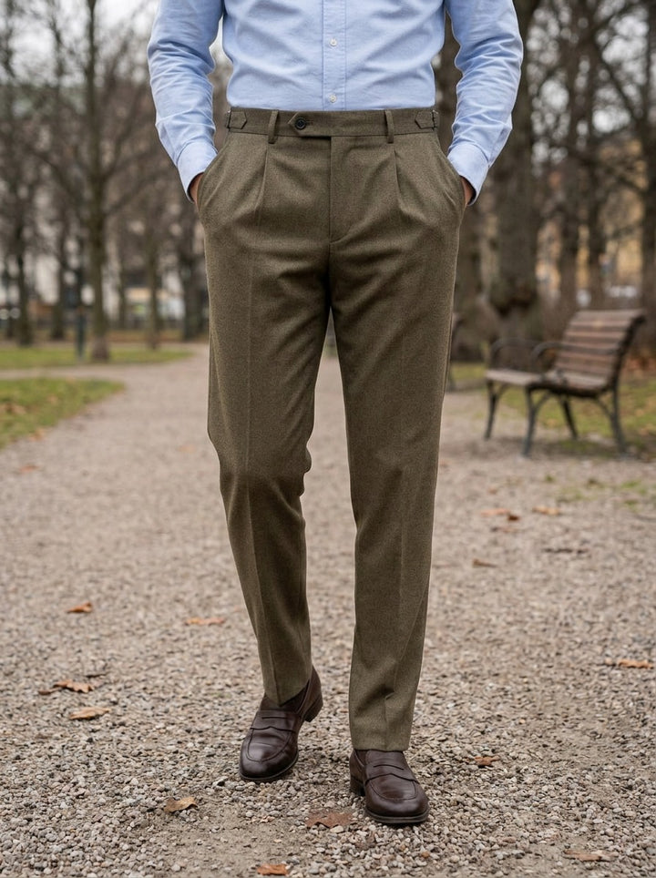 Warwick brushed pleated tapered trousers in Brown, lifestyle on a park path, Gentlemens Manor