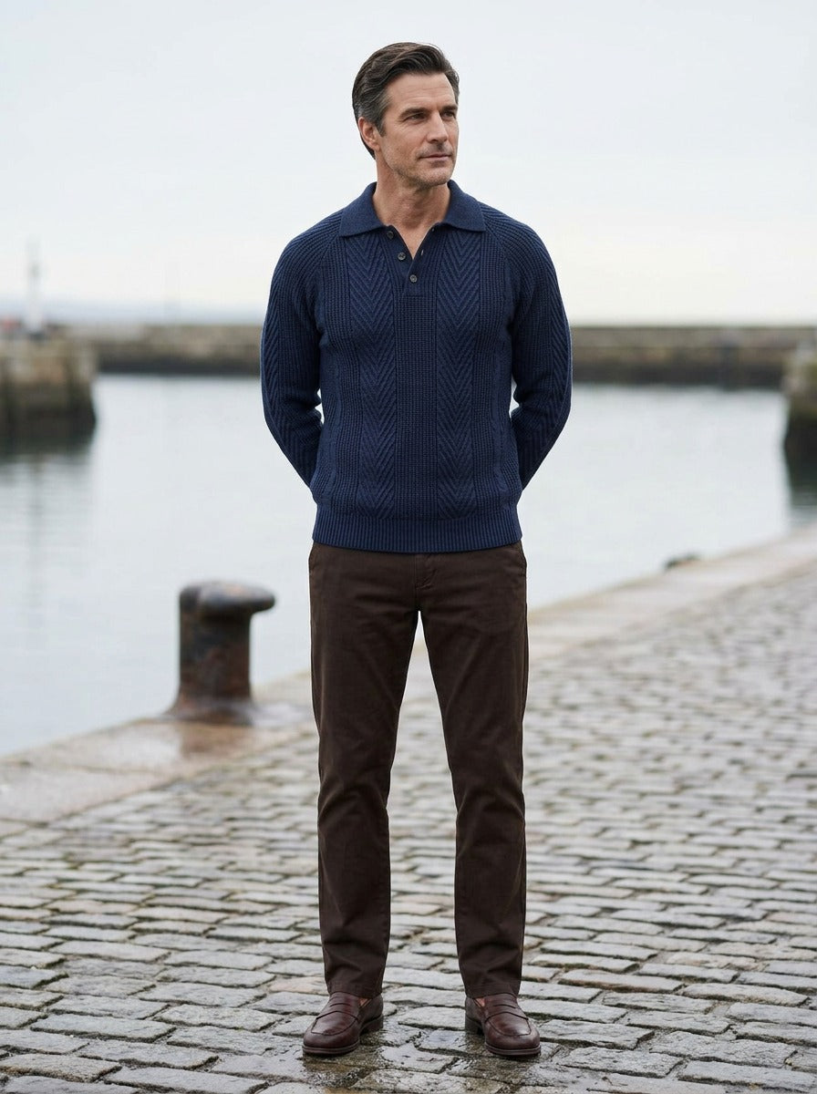 Wexford polo sweater in Navy, lifestyle on a stone harbor quay, Gentlemens Manor