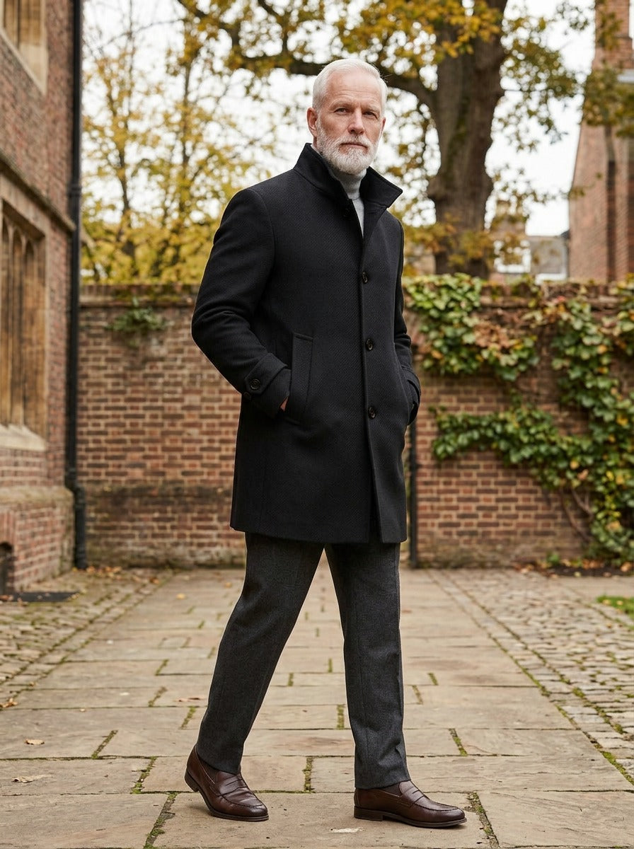 Whitcomb overcoat in Black, lifestyle in a brick college courtyard, Gentlemens Manor