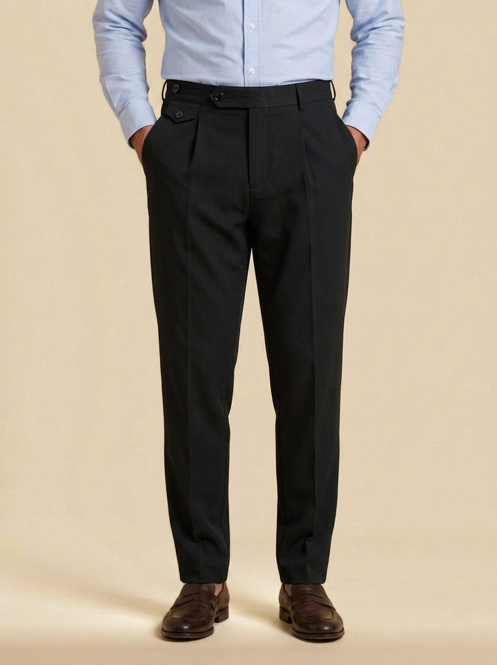 Wilfred button tab tapered trousers in Black, studio, Gentlemens Manor