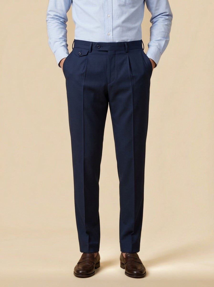 Wilfred button tab tapered trousers in Navy, studio, Gentlemens Manor