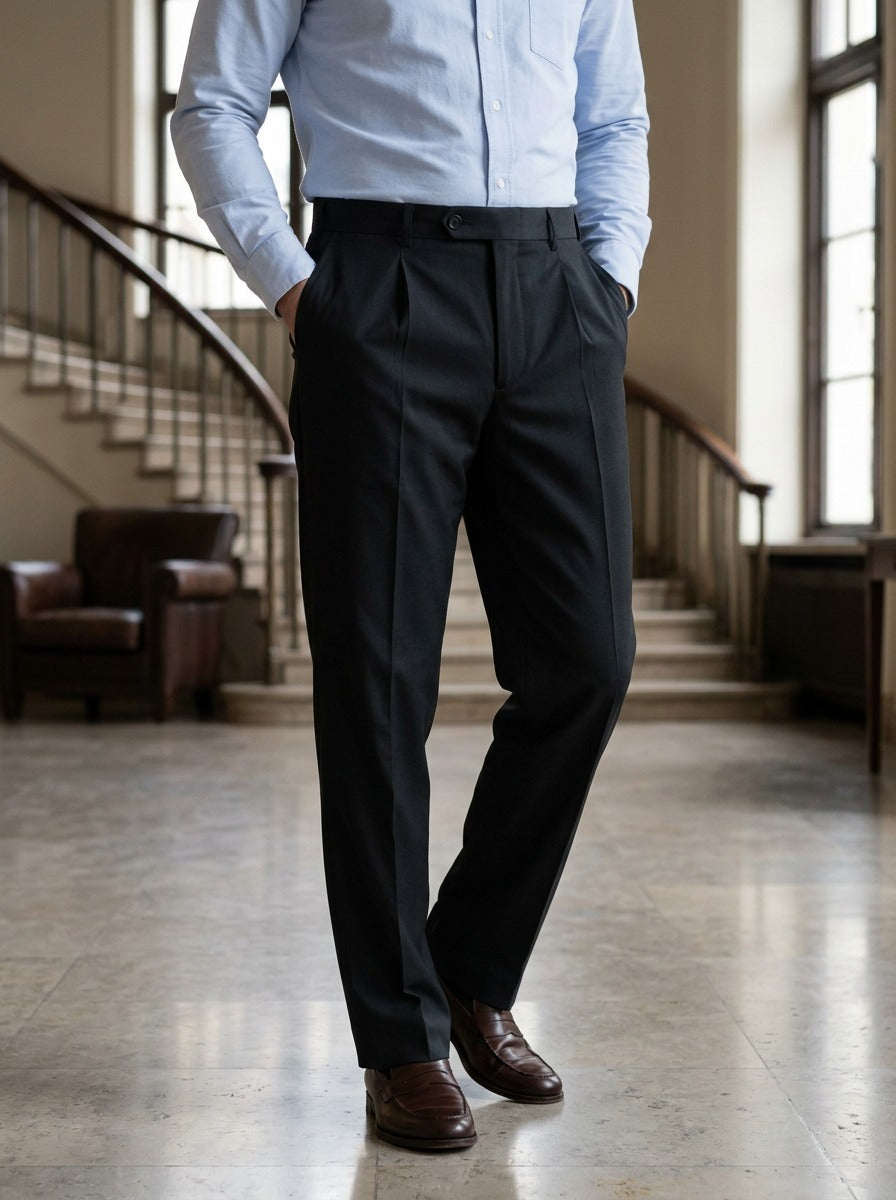 Wolcott pleated dress pants in Black, lifestyle in a hotel lobby, Gentlemens Manor